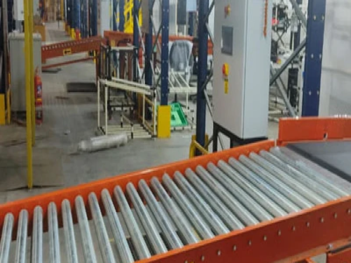 Roller Conveyor — powered roller conveyor line in a warehouse